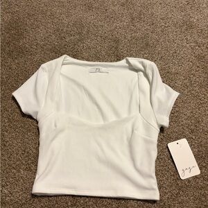 Gage White Ribbed Crop Top
Scoop neck